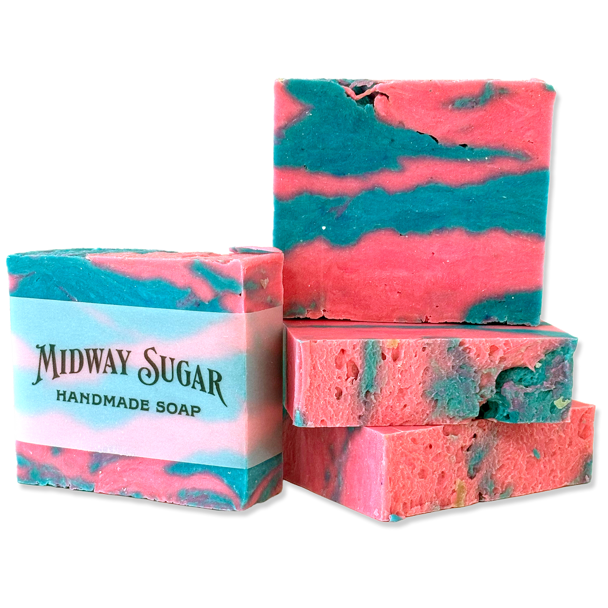 Four handmade soap bars with a pink and teal marbled pattern, featuring a paper label on one bar that reads 'MIDWAY SUGAR HANDMADE SOAP'.