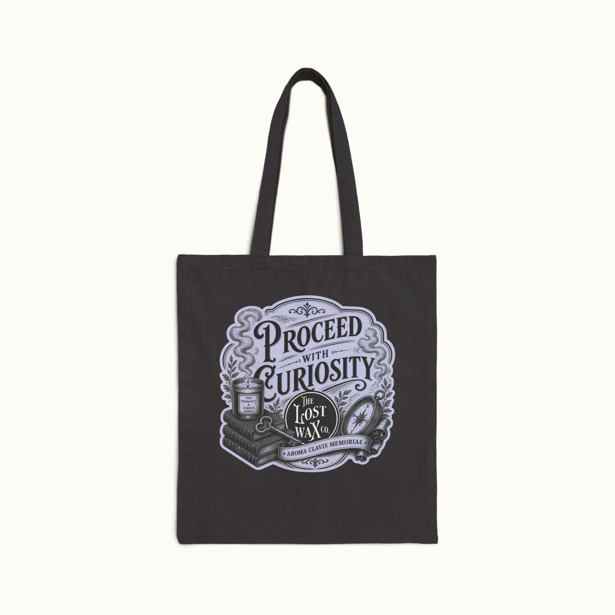 A black canvas tote bag with two handles, featuring a vintage-style illustrated graphic on the front that reads 'PROCEED WITH CURIOSITY' and 'Lost Wax Co.' on a light cream background.