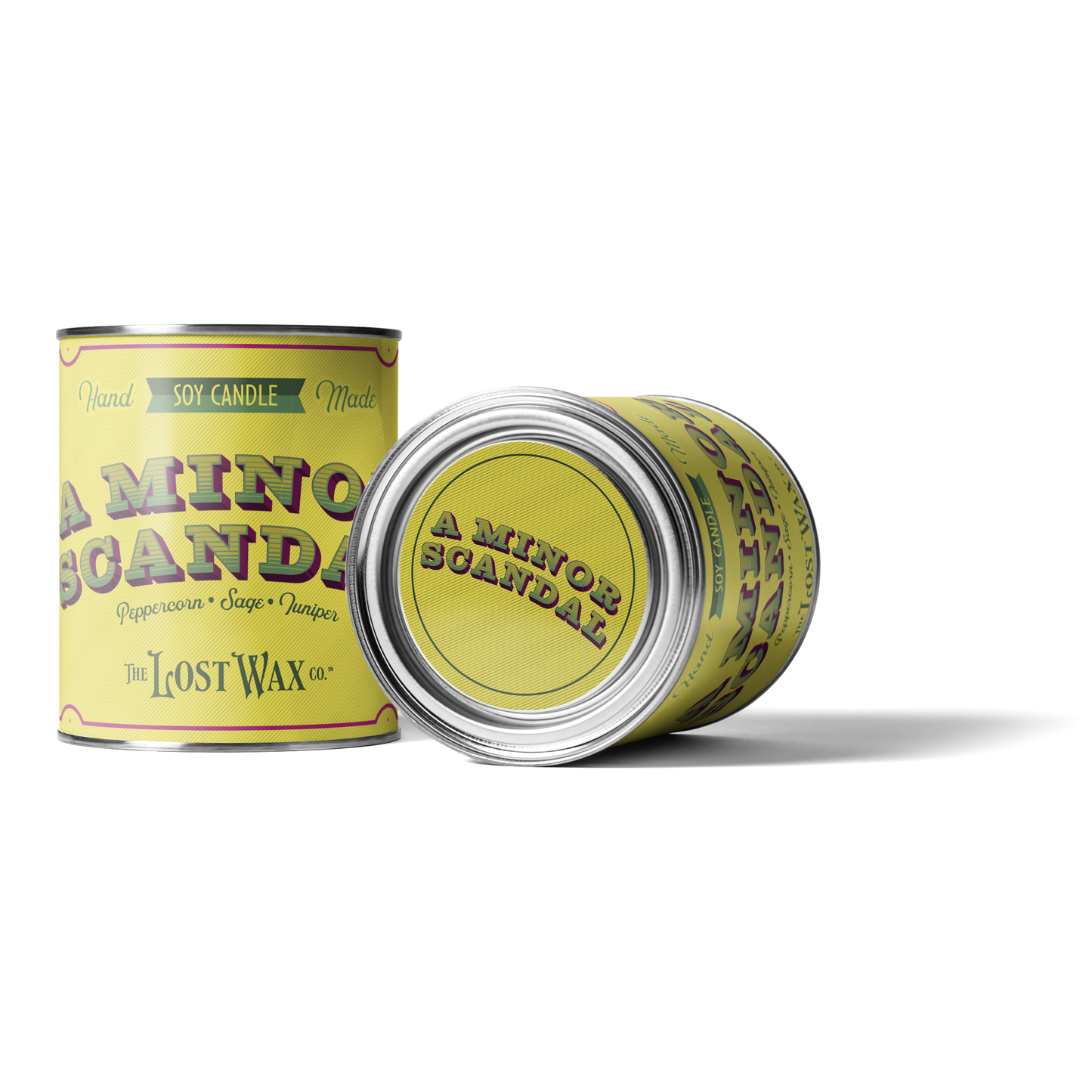 Two cans of 'A Minor Scandal' candle by The Lost Wax Co. on a white background