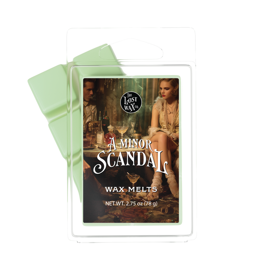 Wax melts packaging with 'A Minor Scandal' design on a white background