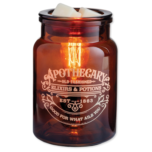 Amber glass jar wax warmer with "Apothecary" label and interior Edison-style light bulb.