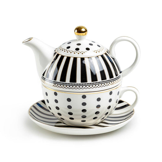 Teapot with black and white striped design on a white background