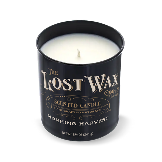 Morning Harvest Scented candle in a black container with 'The Lost Wax Company' branding on a white background