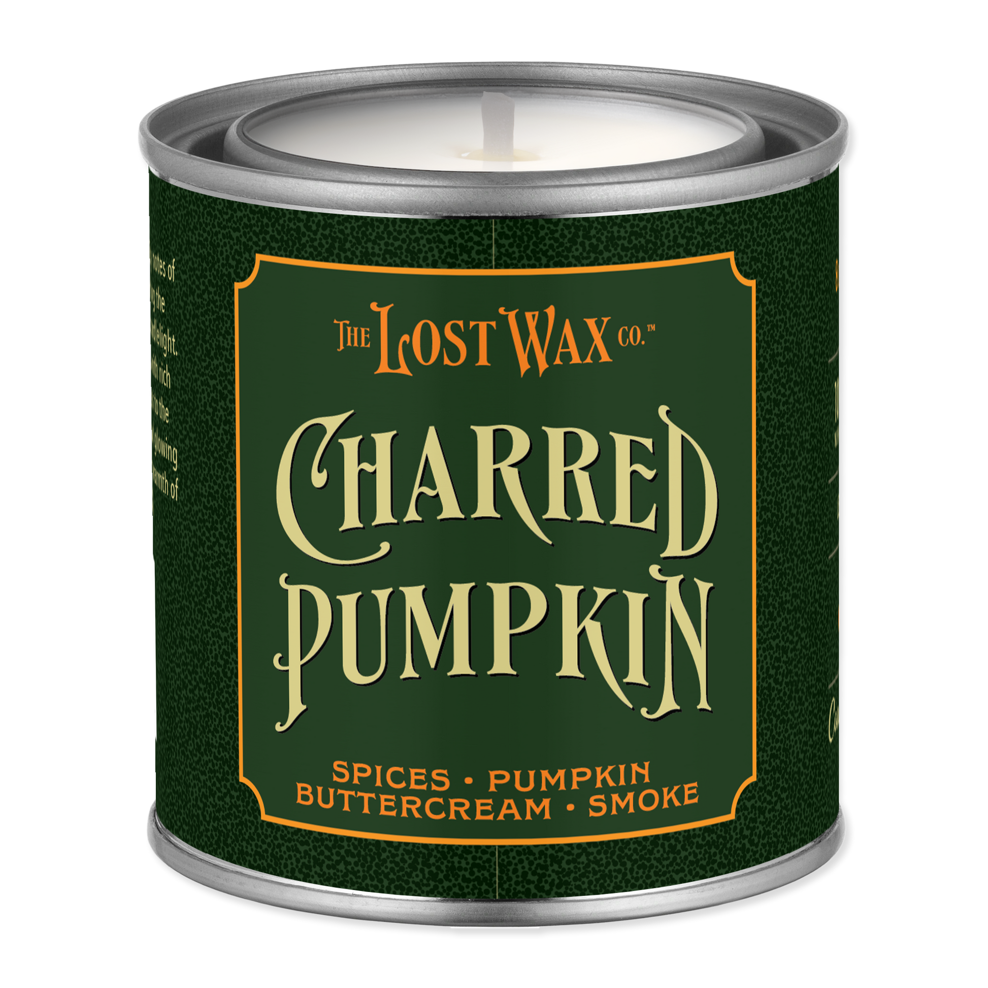 A single-wick candle in a metal tin canister with a dark green label reading 'The Lost Wax Co. Charred Pumpkin' and smaller scent notes 'Spices • Pumpkin • Buttercream • Smoke'.