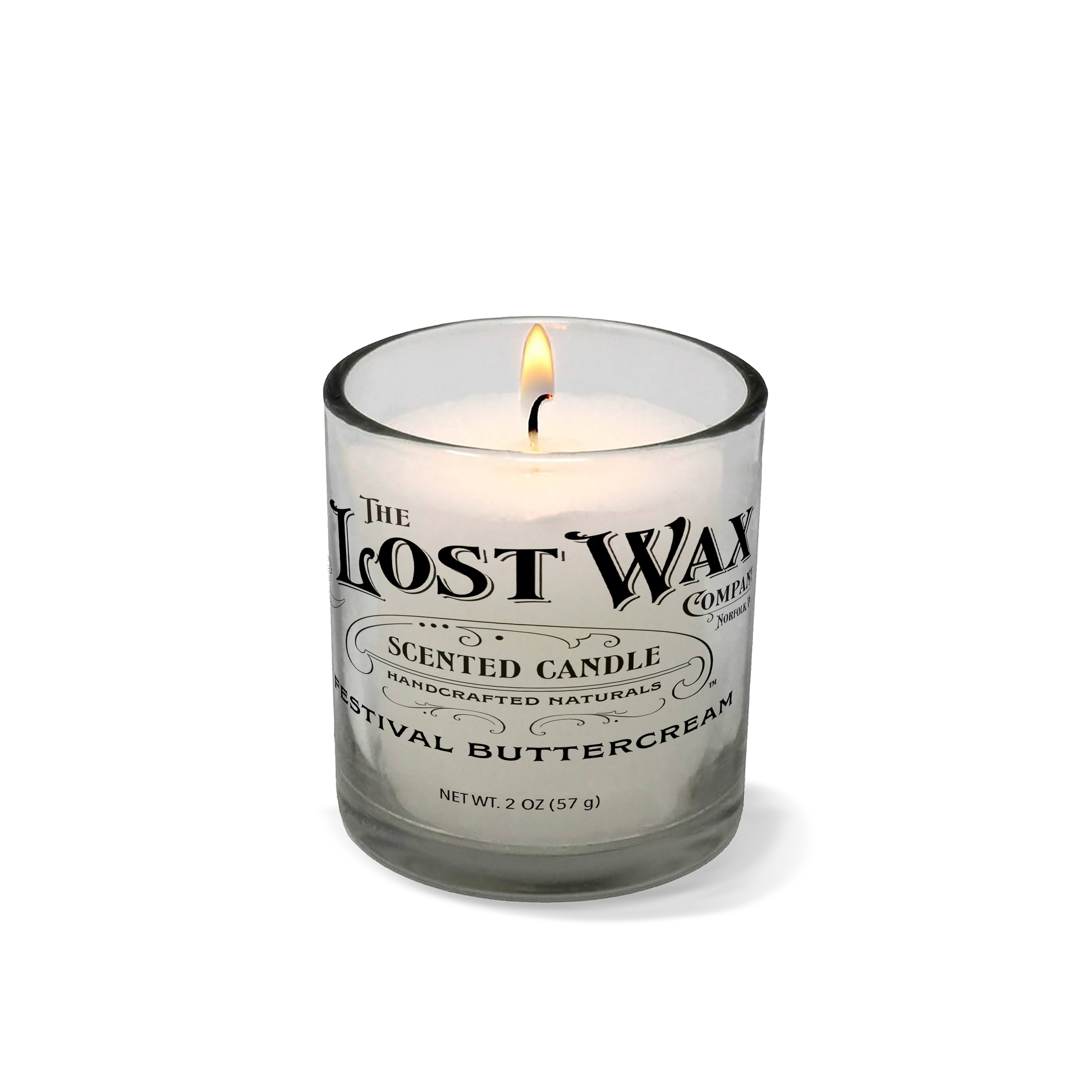 Candle in a clear glass holder on a white background