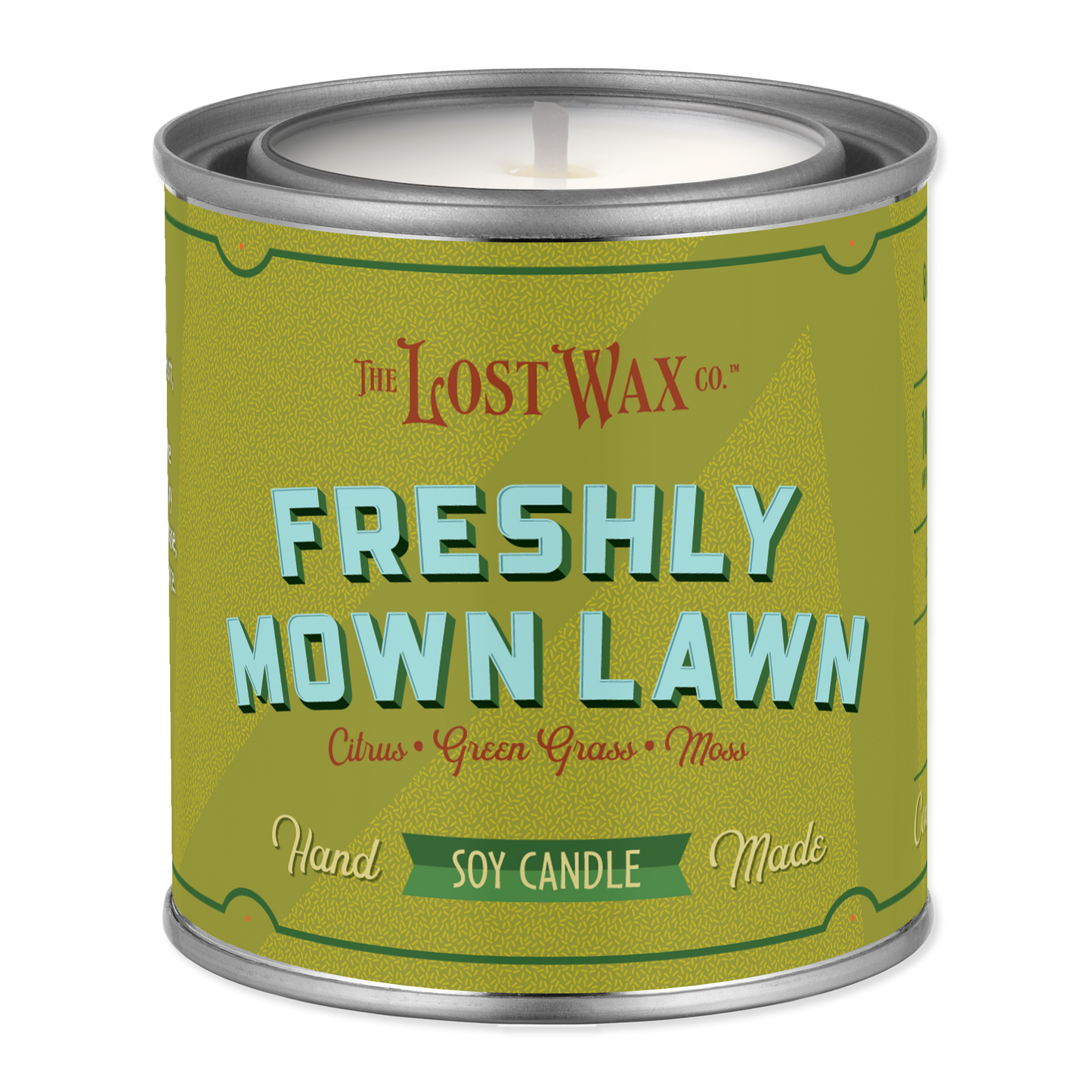 Candle canister labeled 'Freshly Mown Lawn' by Frost Wax on a white background