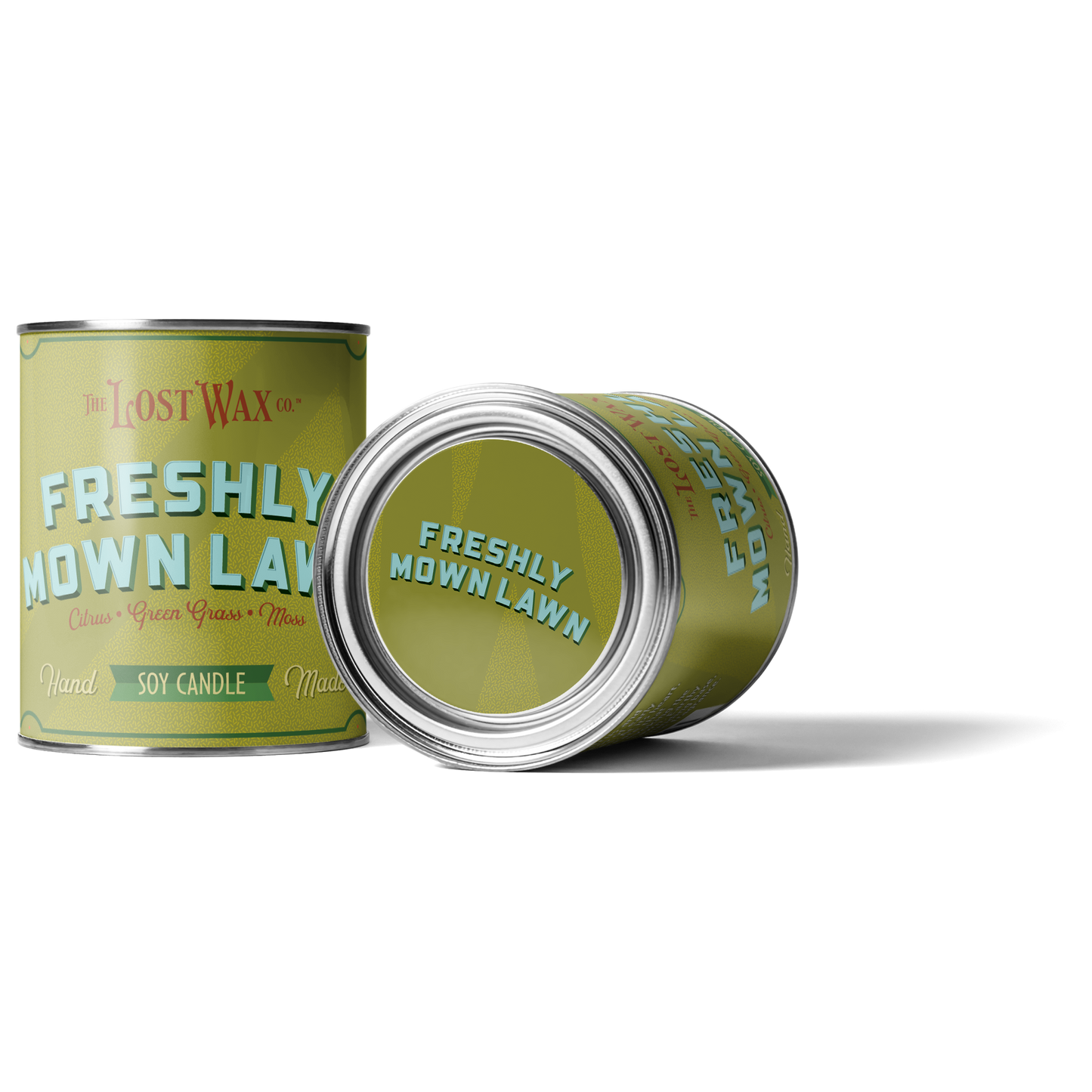 Two cans of 'Freshly Mown Lawn' candle by Lost Wax Co on a white background