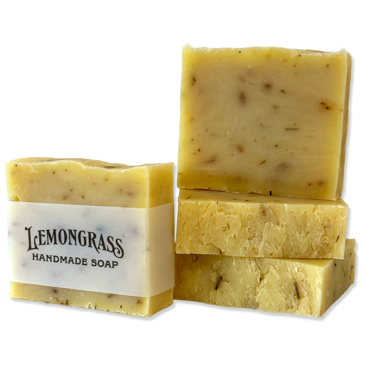 Four handmade soap bars with one wrapped in a white paper band labeled 'LEMONGRASS HANDMADE SOAP,' shown on a plain white background.
