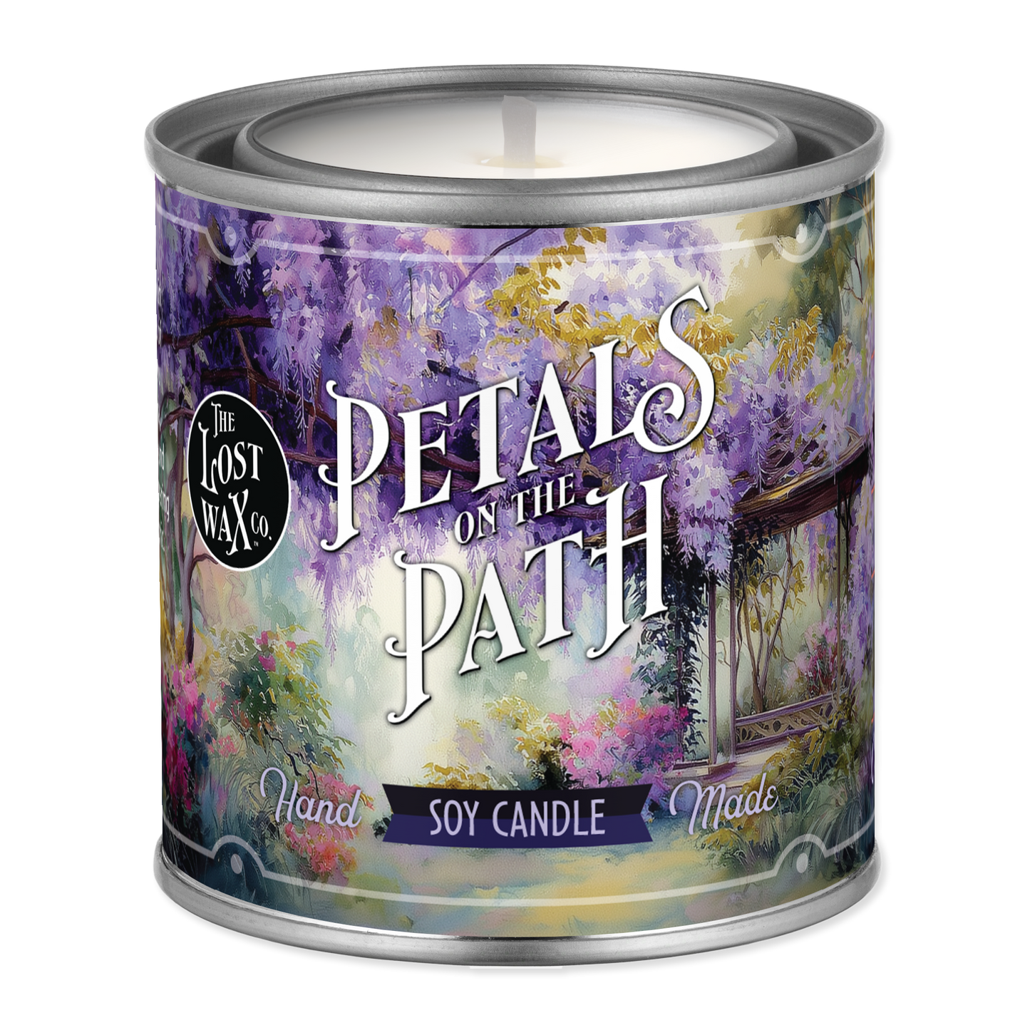 Candle in a decorative tin with 'Petals on the Path' design and 'The Lost Wax Co.' branding.