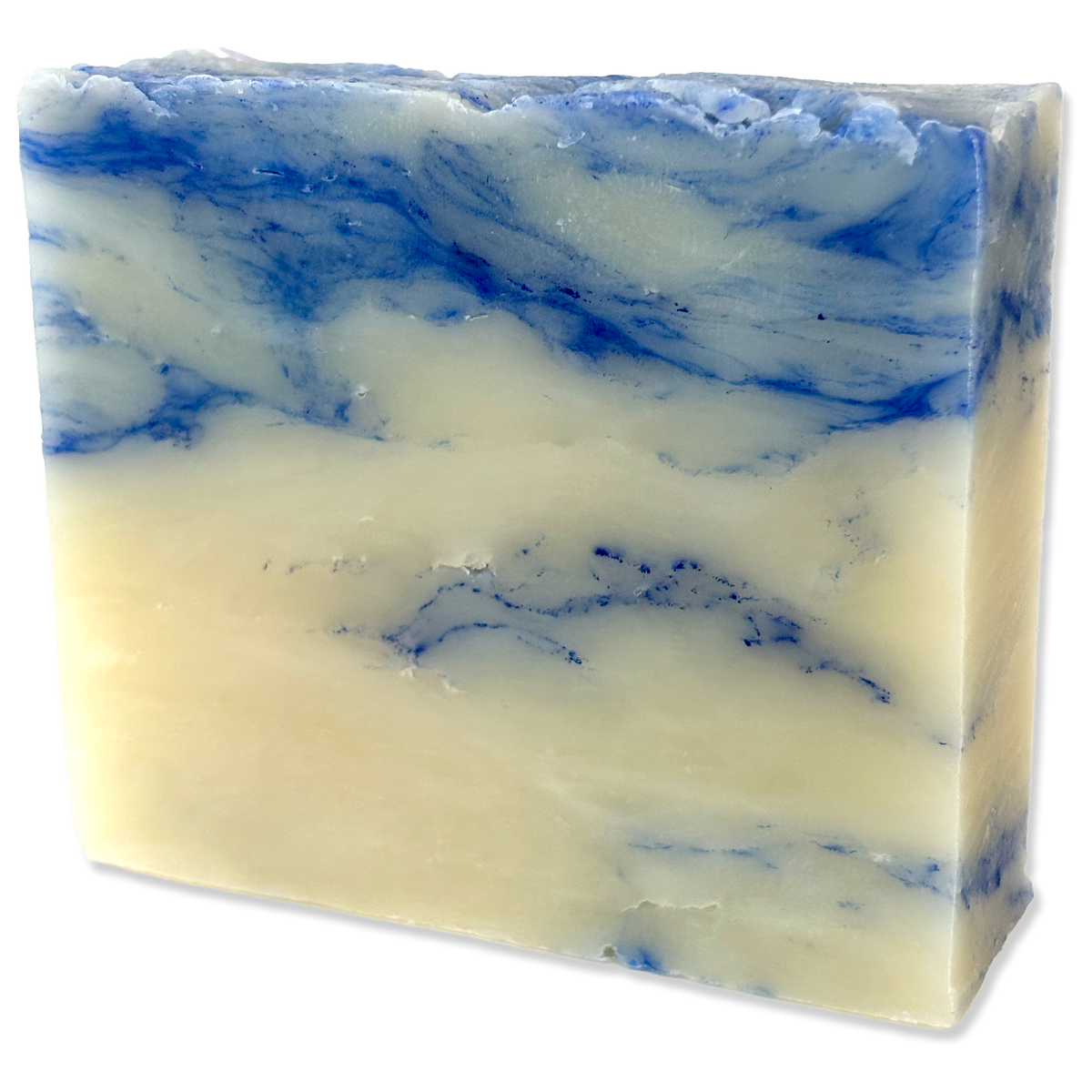 A rectangular bar of handmade soap with a marbled pattern of creamy off-white and vibrant blue, shown on a plain white background.