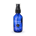 Blue spray bottle labeled 'Tropical Citrus' on a white background