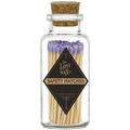 Glass jar with cork lid containing lavender-tipped safety matches branded 'The Lost Wax Co'.
