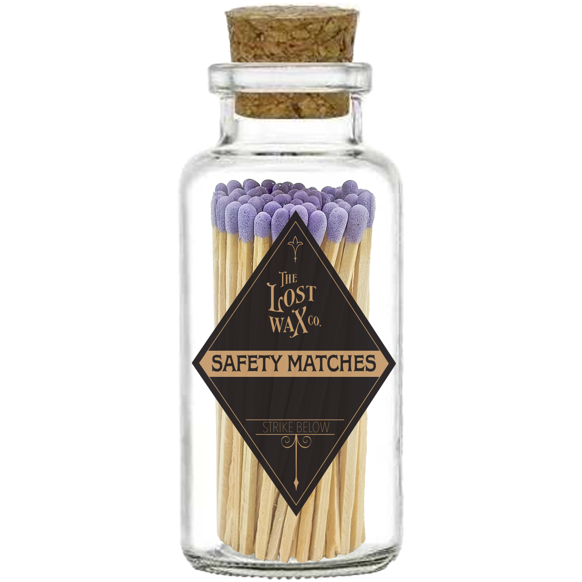 Glass jar with cork lid containing lavender-tipped safety matches branded 'The Lost Wax Co'.