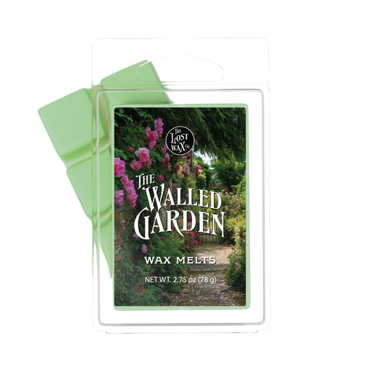 Wax melts packaging with 'The Walled Garden' design on a white background