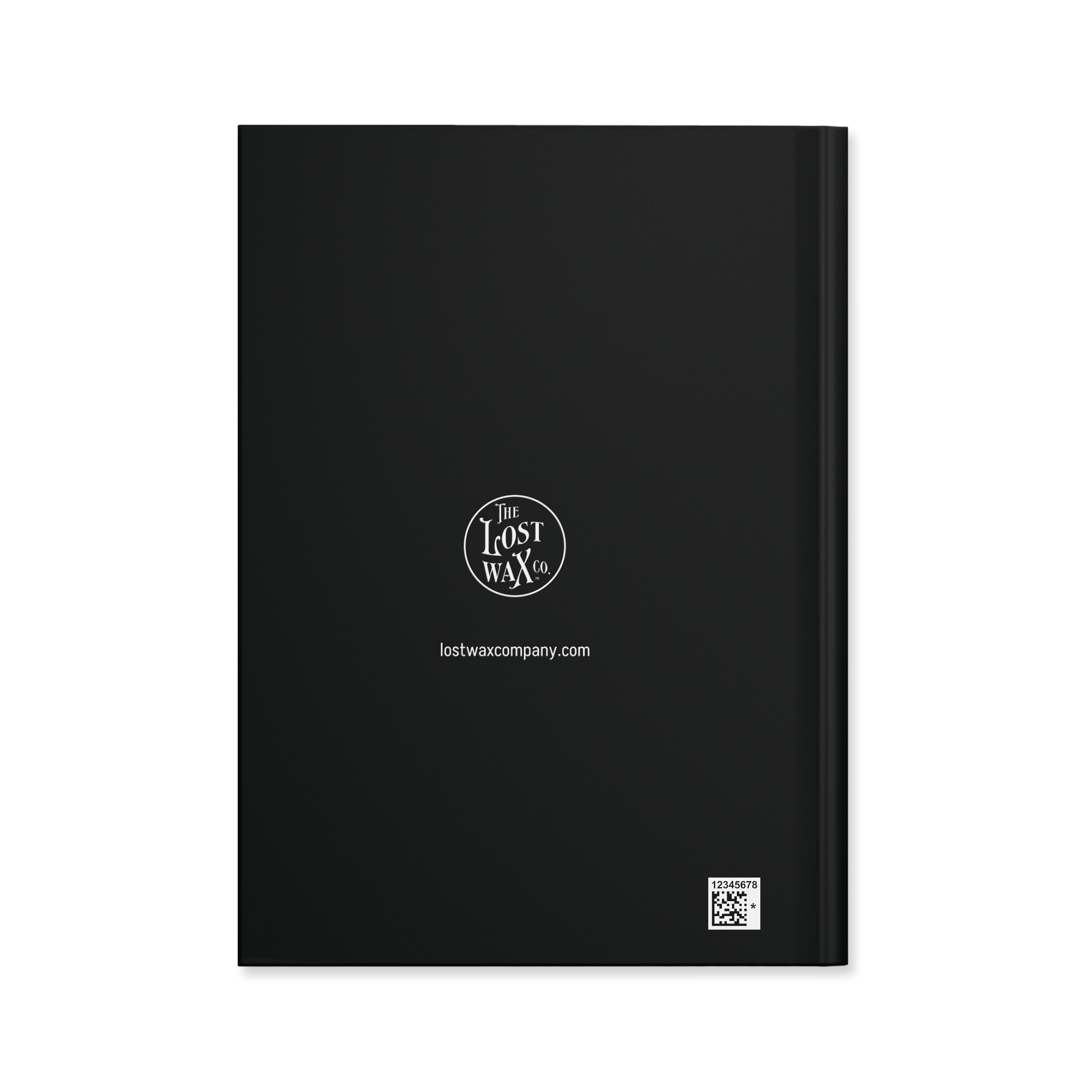 Back of a black notebook or journal, with small logo and URL