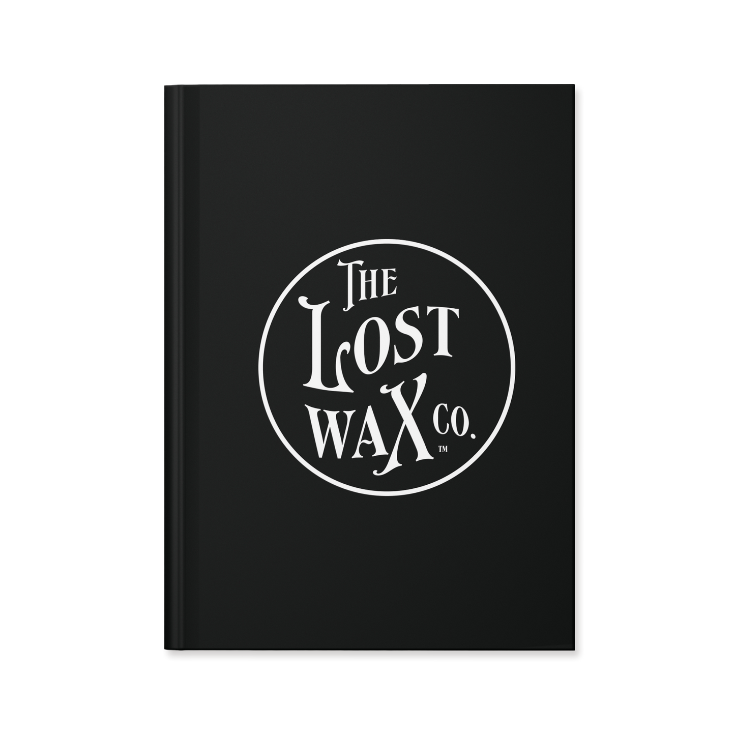 Black notebook journal with white The Lost Wax Co. branding